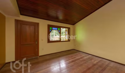 Casa com 3 quartos à venda na Rua Augusto de Lourenço Martins, 110, Vila Nova, Porto Alegre, 185 m2 por R$ 560.000