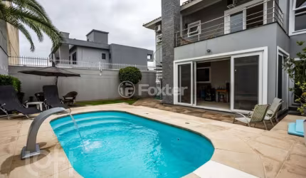 Casa com 4 quartos à venda na Rua Bélgica, 76, Marechal Rondon, Canoas, 221 m2 por R$ 1.999.000
