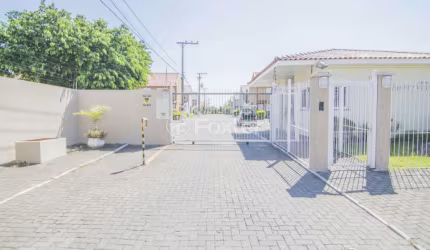 Casa em condomínio fechado com 2 quartos à venda na Rua Treze de Maio, 630, Rio Branco, Canoas, 103 m2 por R$ 250.000