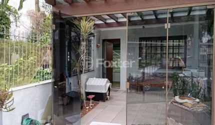 Casa com 3 quartos à venda na Praça Breno Caldas, 242, Jardim Itu Sabará, Porto Alegre, 144 m2 por R$ 680.000