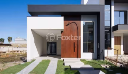Casa em condomínio fechado com 3 quartos à venda na Avenida Wilson Castelo Branco, 700, Beira Rio, Biguaçu, 123 m2 por R$ 749.000