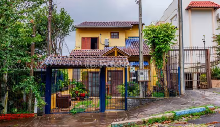 Casa com 4 quartos à venda na Rua Antônio Ribeiro, 160, Santo Antônio, Porto Alegre, 180 m2 por R$ 950.000