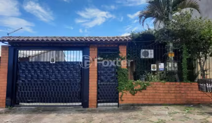 Casa com 3 quartos à venda na Rua Felipe Camarão, 524, Formoza, Alvorada, 330 m2 por R$ 450.000