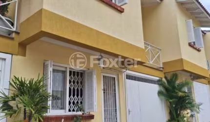 Casa em condomínio fechado com 3 quartos à venda na Rua Barbosa Neto, 205, Cavalhada, Porto Alegre, 129 m2 por R$ 570.000