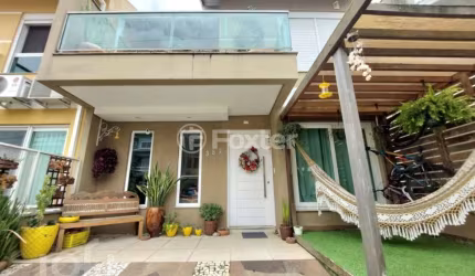 Casa com 4 quartos à venda na Rua Guatambu, 389, Hípica, Porto Alegre, 172 m2 por R$ 799.000