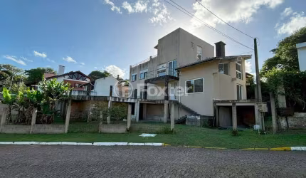 Casa em condomínio fechado com 4 quartos à venda na Rua Cangerana, 400, São Lucas, Viamão, 400 m2 por R$ 695.000