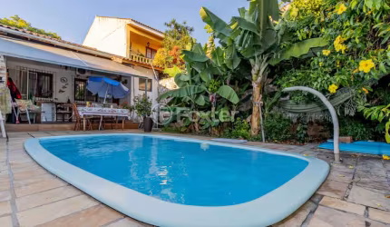 Casa com 3 quartos à venda na Rua Menezes Paredes, 256, Nonoai, Porto Alegre, 131 m2 por R$ 580.000