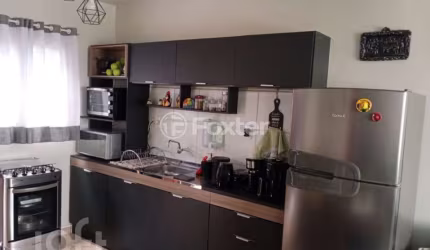 Casa em condomínio fechado com 2 quartos à venda na Rua Doutor Karl Wilhelm Schinke, 1376, Rondônia, Novo Hamburgo, 59 m2 por R$ 249.000