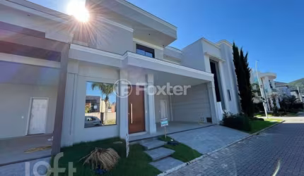 Casa em condomínio fechado com 3 quartos à venda na Avenida Deltaville, 47, Beira Rio, Biguaçu, 176 m2 por R$ 1.199.000