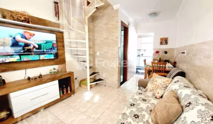 Casa em condomínio fechado com 2 quartos à venda na Avenida Vicente Monteggia, 2762, Cavalhada, Porto Alegre, 48 m2 por R$ 149.900