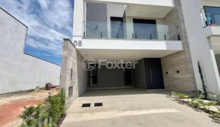 Casa em condomínio fechado com 3 quartos à venda na Avenida Wilson Castelo Branco, 373, Beira Rio, Biguaçu, 195 m2 por R$ 1.180.000