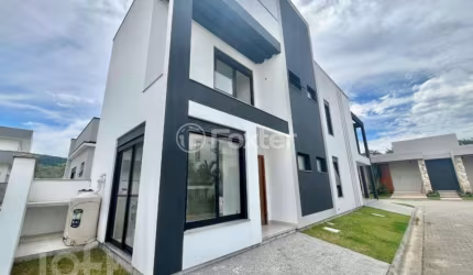 Casa em condomínio fechado com 3 quartos à venda na Avenida Wilson Castelo Branco, 292, Beira Rio, Biguaçu, 189 m2 por R$ 1.090.000