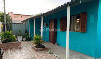 Casa com 4 quartos à venda na Quadra D Quatro B, 12, Guajuviras, Canoas, 270 m2 por R$ 299.999
