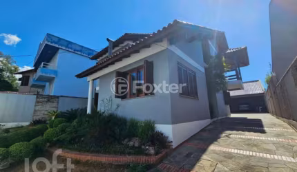 Casa com 4 quartos à venda na Rua Armando Dias Azevedo, 65, São José, Canoas, 219 m2 por R$ 1.030.000