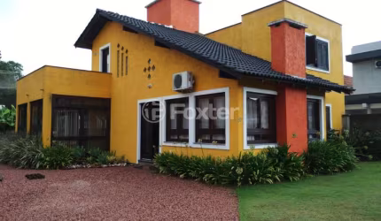 Casa em condomínio fechado com 3 quartos à venda na Rua Grápia, 97, São Lucas, Viamão, 148 m2 por R$ 750.000