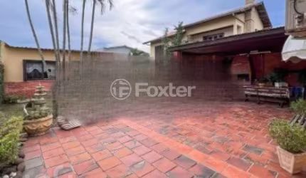 Casa com 3 quartos à venda na Rua das Camélias, 812, Igara, Canoas, 119 m2 por R$ 600.000
