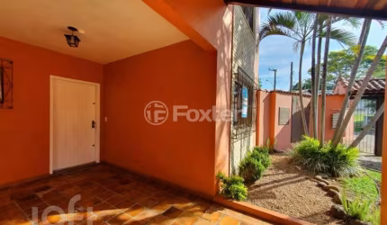Casa em condomínio fechado com 3 quartos à venda na Rua Aracy Barcelos Fonseca, 68, Oriço, Gravataí, 149 m2 por R$ 390.000