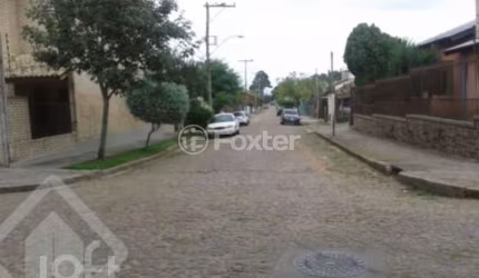 Casa com 4 quartos à venda na Rua Jacundá, 638, Guarujá, Porto Alegre, 480 m2 por R$ 650.000