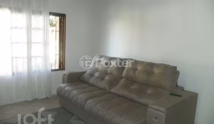 Casa com 3 quartos à venda na Rua Alberto Zolin Filho, 41, Hípica, Porto Alegre, 118 m2 por R$ 400.000