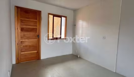 Casa em condomínio fechado com 2 quartos à venda na Rua Dalva de Oliveira, 272, Neópolis, Gravataí, 48 m2 por R$ 225.000