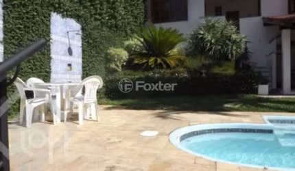 Casa com 5 quartos à venda na Rua Miracema, 27, Chácara das Pedras, Porto Alegre, 250 m2 por R$ 1.600.000