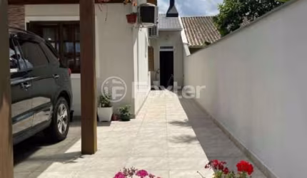 Casa com 3 quartos à venda na Rua Stringhini, 99, Hípica, Porto Alegre, 154 m2 por R$ 595.000