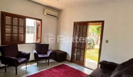 Casa com 4 quartos à venda na Travessa Antilhas, 73, Piratini, Sapucaia do Sul, 181 m2 por R$ 392.000