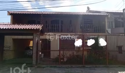 Casa com 4 quartos à venda na Rua Doutor Décio Martins Costa, 129, Vila Eunice Nova, Cachoeirinha, 300 m2 por R$ 850.000