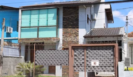 Casa com 3 quartos à venda na Rua Dona Firmina, 143, Vila São José, Porto Alegre, 165 m2 por R$ 680.000