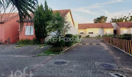 Casa em condomínio fechado com 2 quartos à venda na Rua Irmã Maria Hiltgardis, 18, Olaria, Canoas, 112 m2 por R$ 300.000