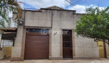 Casa com 3 quartos à venda na Rua Santos Dumont, 1582, Navegantes, Porto Alegre, 150 m2 por R$ 1.590.000