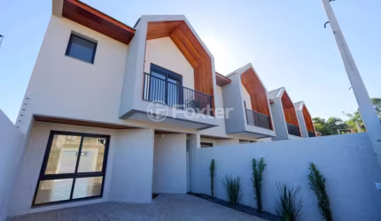 Casa em condomínio fechado com 3 quartos à venda na Rua Professora Delphina Ferrari, 236, Igara, Canoas, 124 m2 por R$ 720.000