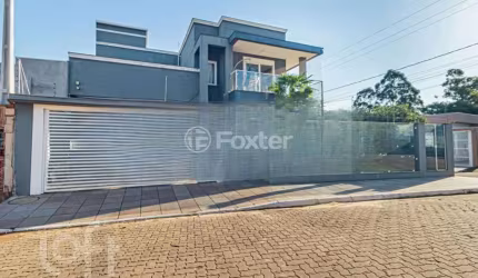 Casa com 3 quartos à venda na Rua Euclides Correa Machado, 340, Freitas, Sapucaia do Sul, 265 m2 por R$ 1.590.000