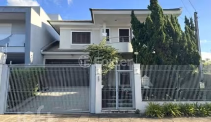 Casa com 3 quartos à venda na Rua País de Gales, 627, Marechal Rondon, Canoas, 196 m2 por R$ 1.350.000