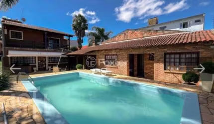 Casa com 4 quartos à venda na Rua Bernardino de Oliveira Fonseca, 215, Centro, Gravataí, 340 m2 por R$ 2.300.000