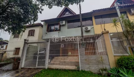 Casa com 4 quartos à venda na Rua Monte Flor, 291, Jardim Floresta, Porto Alegre, 160 m2 por R$ 550.000
