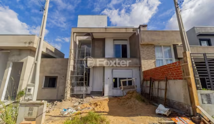 Casa em condomínio fechado com 3 quartos à venda na Rua Agenor Jardim Rosa, 157, Loteamento Jardim Timbaúva, Gravataí, 140 m2 por R$ 807.000