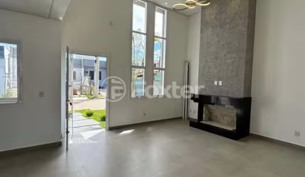 Casa em condomínio fechado com 3 quartos à venda na Estrada Caminho do Meio, 2815, Cocão, Viamão, 94 m2 por R$ 550.000