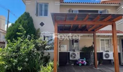 Casa em condomínio fechado com 3 quartos à venda na Avenida João Ferreira Jardim, 140, Parque Santa Fé, Porto Alegre, 116 m2 por R$ 379.000
