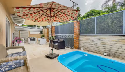 Casa com 4 quartos à venda na Rua Monte Alverne, 502, Chácara das Pedras, Porto Alegre, 357 m2 por R$ 2.750.000