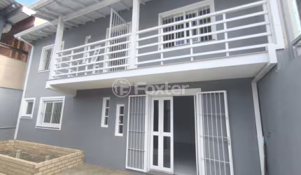 Casa com 3 quartos à venda na Rua Luís Linck Barcelos, 35, Loteamento Jardim Timbaúva, Gravataí, 164 m2 por R$ 372.500