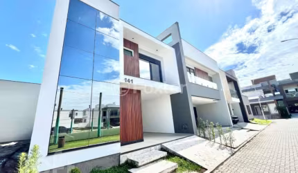 Casa em condomínio fechado com 3 quartos à venda na Avenida Deltaville, 141, Beira Rio, Biguaçu, 193 m2 por R$ 1.300.000