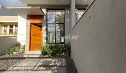 Casa com 3 quartos à venda na Rua Euclides Linck, 346, Oriço, Gravataí, 78 m2 por R$ 485.000