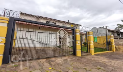 Casa com 4 quartos à venda na Rua das Petúnias, 277, Estância Velha, Canoas, 182 m2 por R$ 990.000