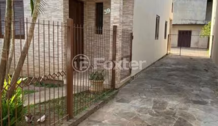 Casa com 4 quartos à venda na Rua Japeju, 39, Arquipélago, Porto Alegre, 180 m2 por R$ 1.300.000