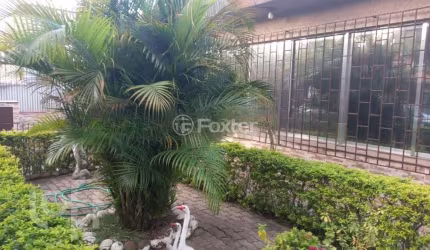 Casa com 3 quartos à venda na Rua Paul Harris, 26, Jardim Itu Sabará, Porto Alegre, 134 m2 por R$ 749.900