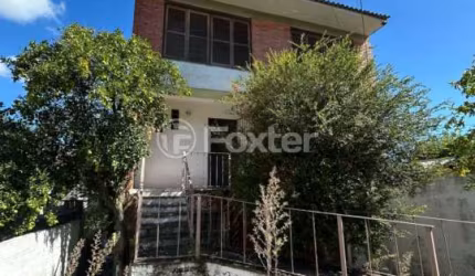Casa com 2 quartos à venda na Rua Águas Mortas, 71, Medianeira, Porto Alegre, 245 m2 por R$ 450.000