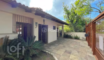 Casa com 3 quartos à venda na Avenida Ararangua, 126, Guarujá, Porto Alegre, 210 m2 por R$ 430.000