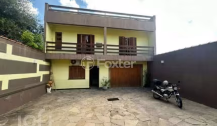 Casa com 4 quartos à venda na Rua Monte Bonito, 32, Jardim Floresta, Porto Alegre, 200 m2 por R$ 1.200.000