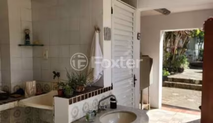 Casa com 4 quartos à venda na Rua Itaboraí, 230, Jardim Botânico, Porto Alegre, 180 m2 por R$ 1.050.000